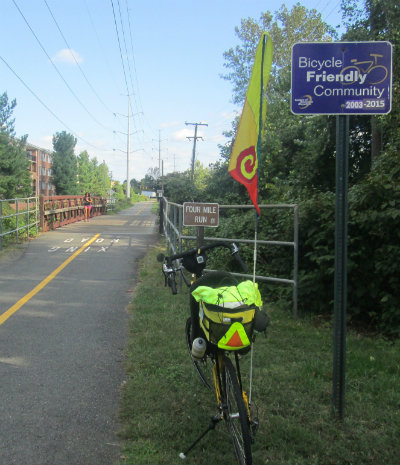 Jim-Schmid's-Bacchetta-Giro-recumbent-next-to-Bicycle-Friendly-sign-W&OD-Rail-Trail-VA-2015-10-6&7